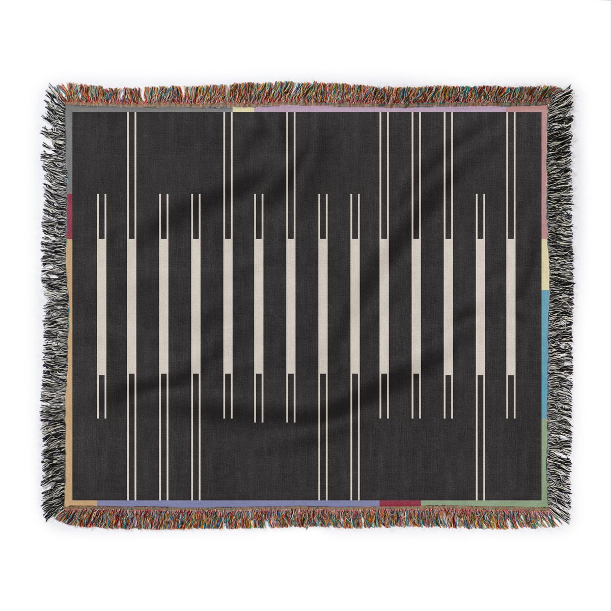 Fula I (dusk) – black & white striped woven blanket with colorful border