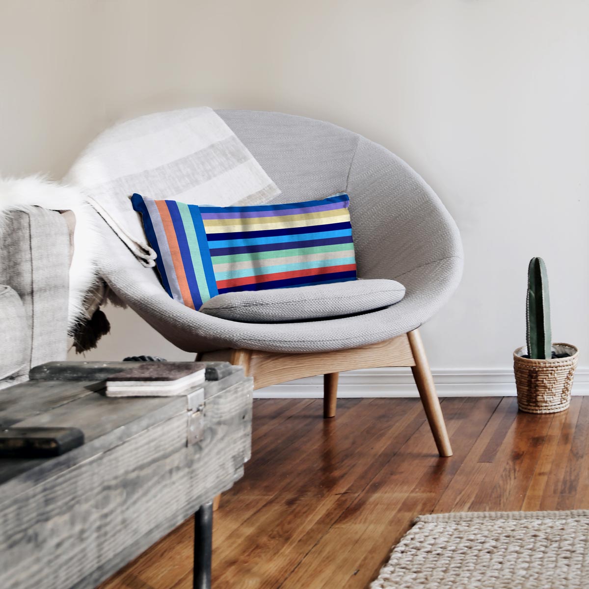Striped Lumbar Pillow (blues) – indoor/outdoor pillow